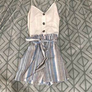 Cute romper and in good condition only been worn twise. Size S